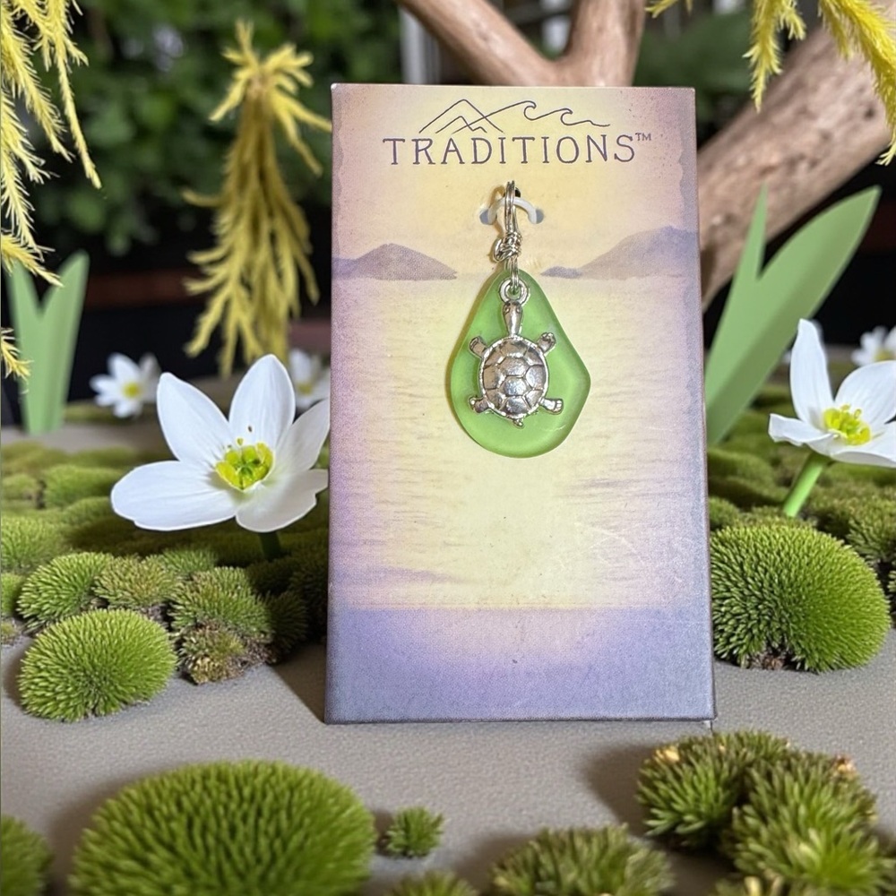 Traditions Turtle Pendant on Green Background
